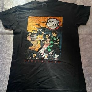 I am selling a Demon Slayer graphic tee in size medium in different colors.